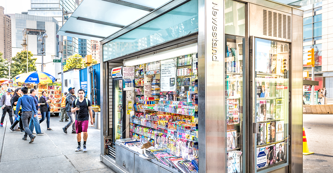 A newstand on a city steet