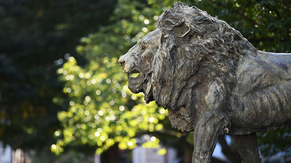Bronze statue of a lion on the Columbia University Morningside campus